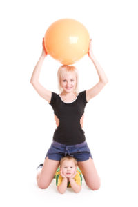 mother and small son going in for sports